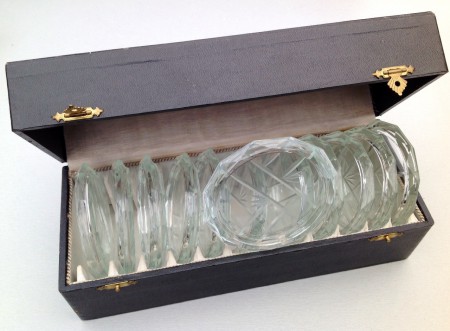 12 mooie kristalglazen onderzetters € 17,50